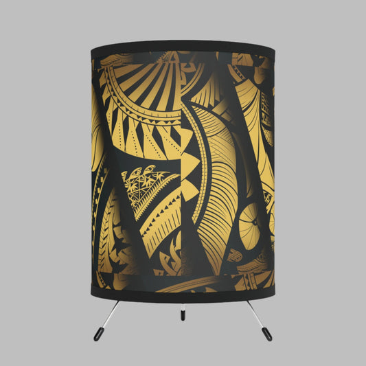 Polynesian-Inspired Elegant Tripod Lamp with Gold Shade side view